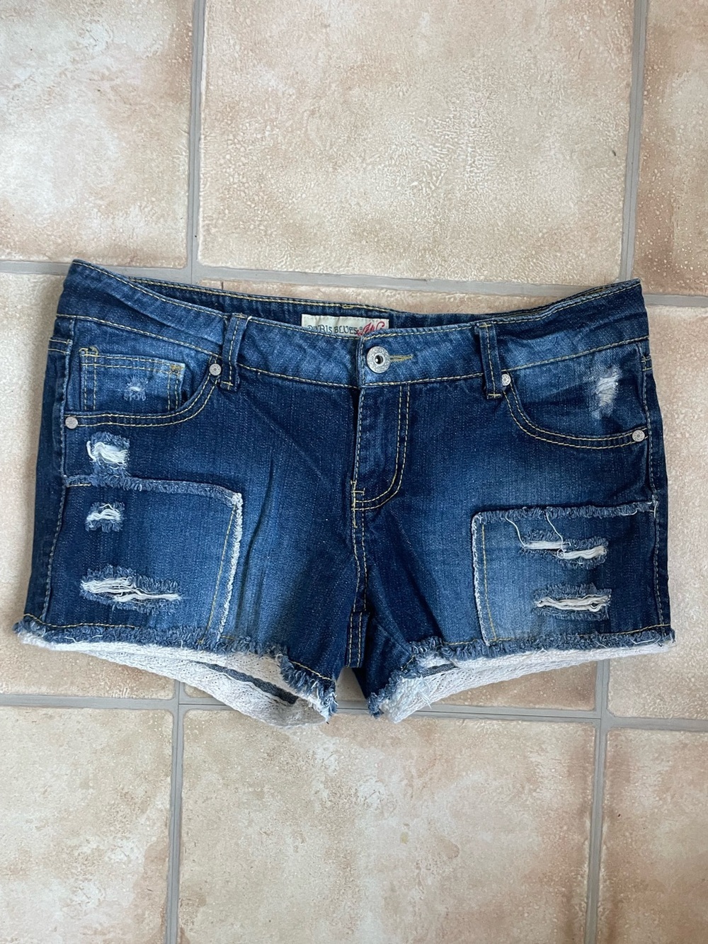 Vintage Paris Blues dark wash distressed denim shorts, lace hem line; size 11